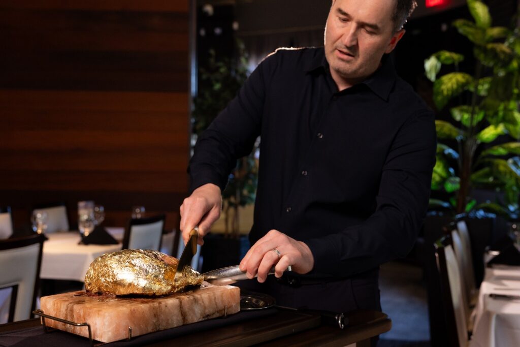 The Golden Steak® is the most noble part of the top sirloin, expertly seasoned with salt and then decadently enveloped in 24-karat edible gold foil. A bespoke cart approaches your table, presenting the Golden Steak® in all its splendor, and the Gaucho Chef then artfully carves this luxurious meat selection with a golden knife.

Elevate your dining experience with every golden bite. Join us today at Galpão Gaucho Brazilian Steakhouse
✨💛 🥩

Which location are you heading to? 
Cupertino, CA
Irvine, CA
Napa, CA
Roseville, CA
San Diego, CA
Walnut Creek, CA
Las Vegas, NV
Charleston, SC
